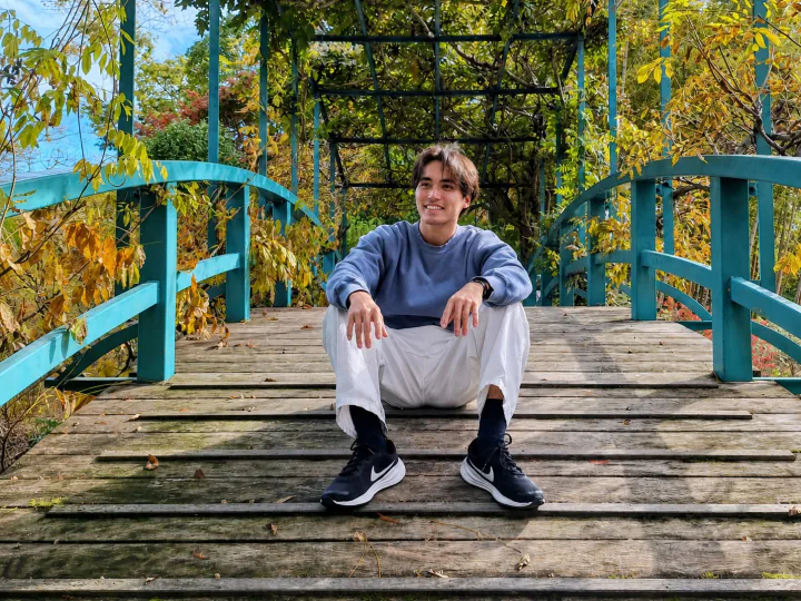 Jacob Seiji Skowronek seated outdoors in Japan